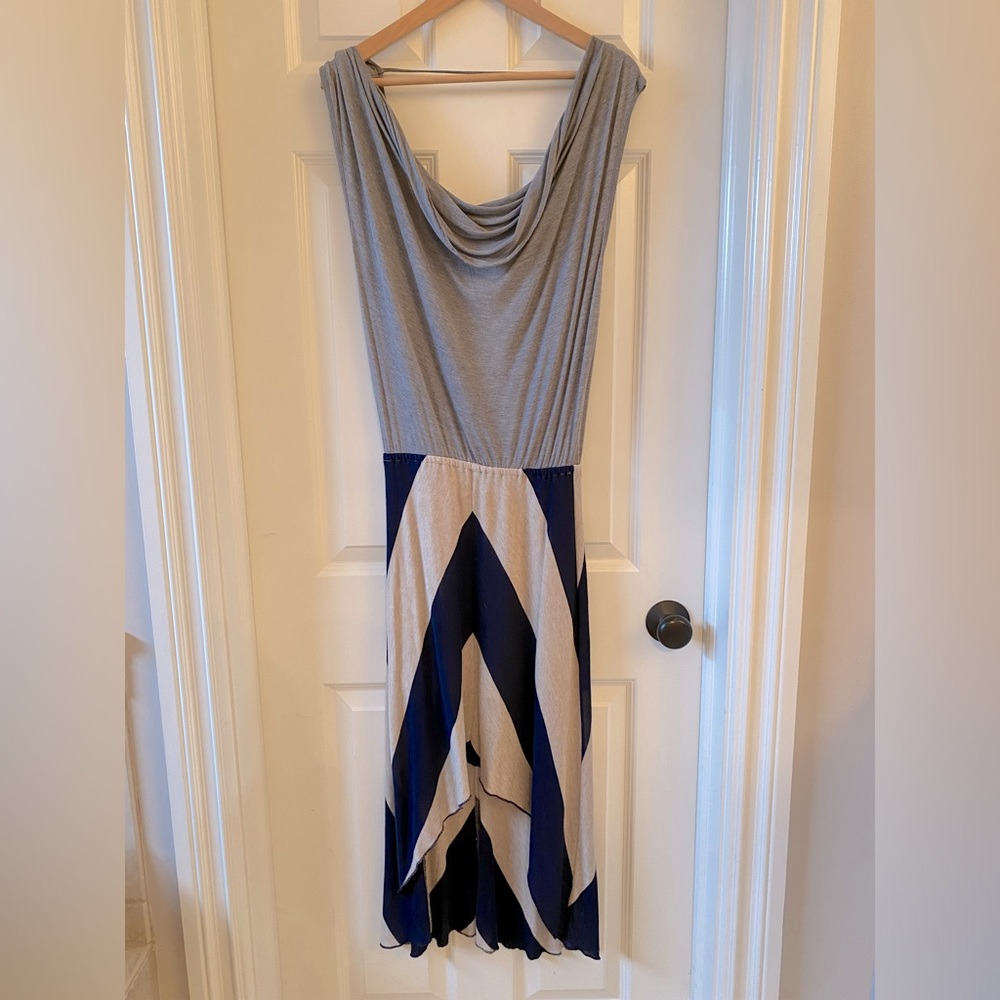 Designer jersey dress with deep v-neck back.